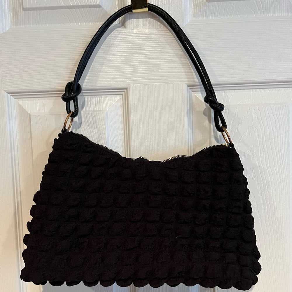Black ruffled purse